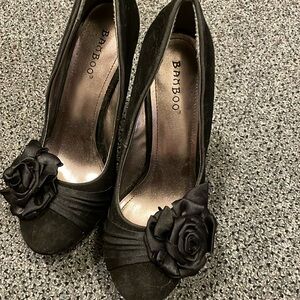 Fancy, sexy stilettos with adorable bow in front